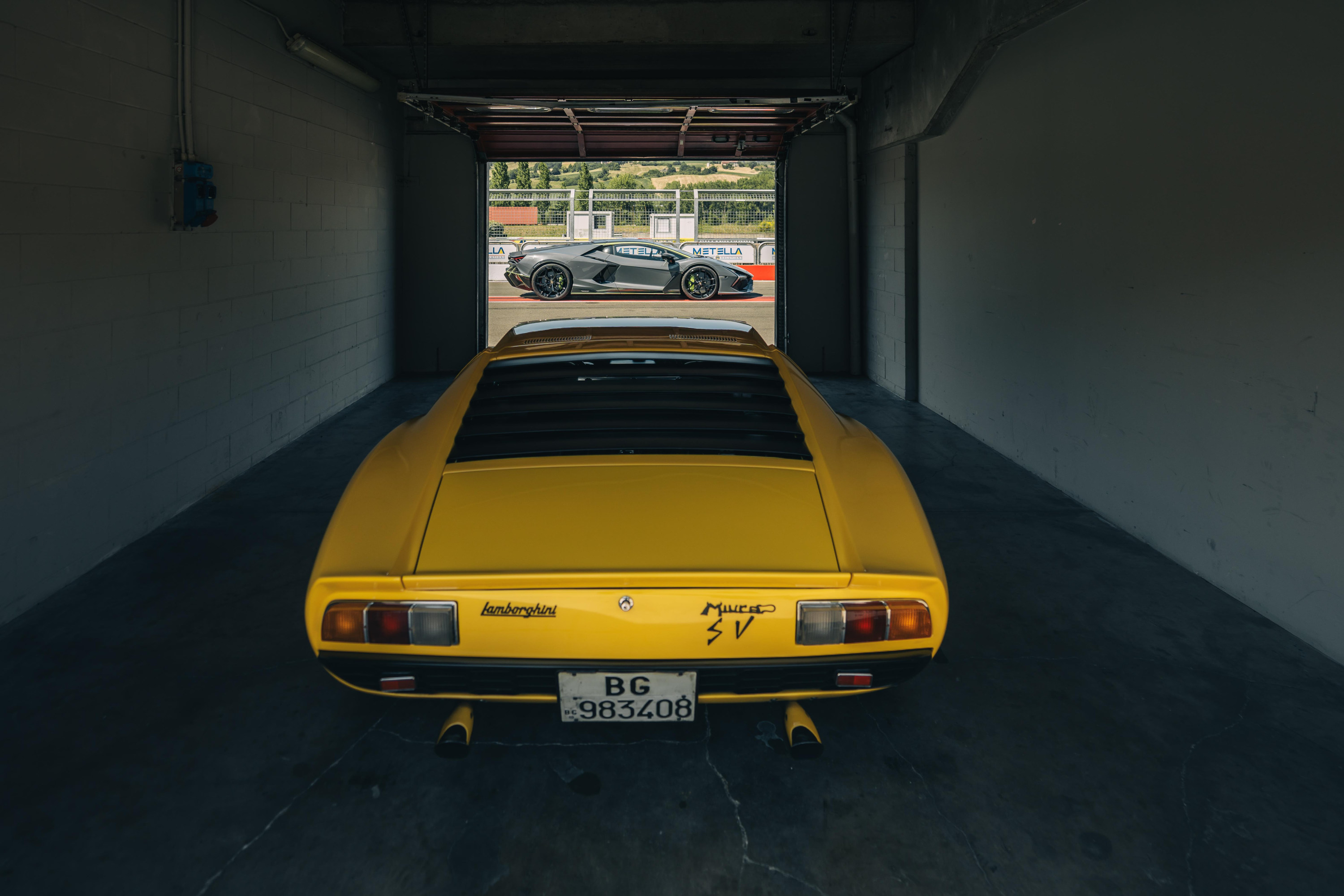 The Miura with the modern day Revuelto in the distance
