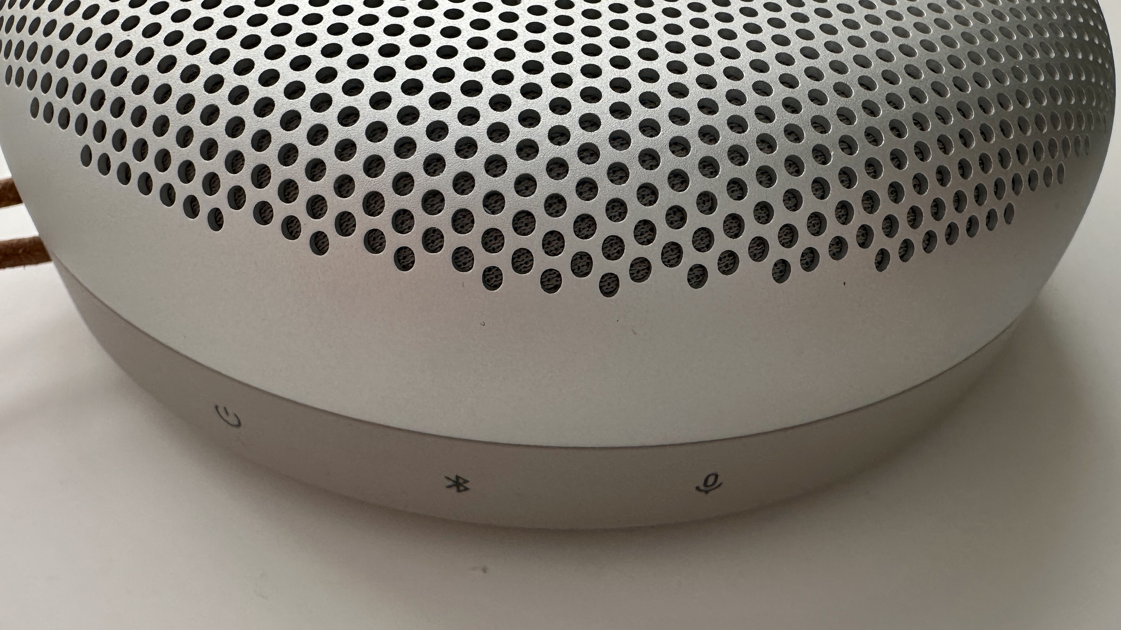 Bang & Olufsen Beosound A1 3rd Generation in silver, on gray table