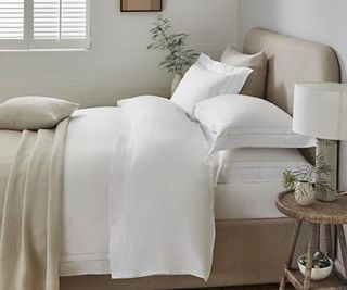 Egyptian Cotton Sateen Sheet Set on a bed