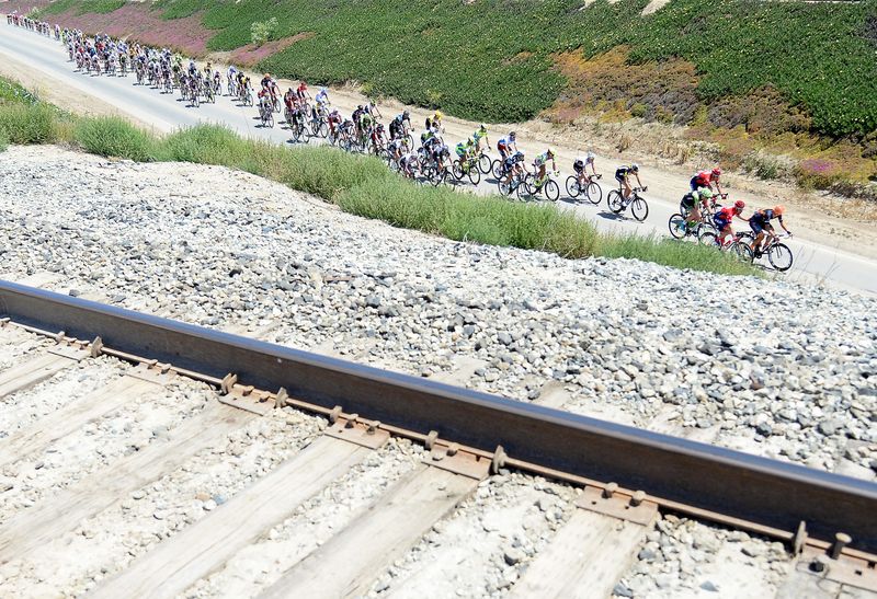 The race rides alongside a train track
