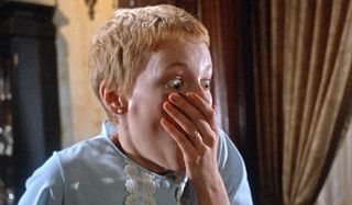 Rosemary's Baby Mia Farrow covers her face in shock