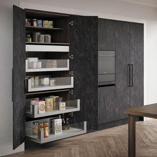 Tall kitchen unit with a mix of drawers and shelves inside