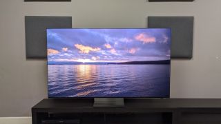 Samsung R95H listing image showing a sunrise over a lake