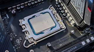 intel Alder Lake, processors on motherboard and on table