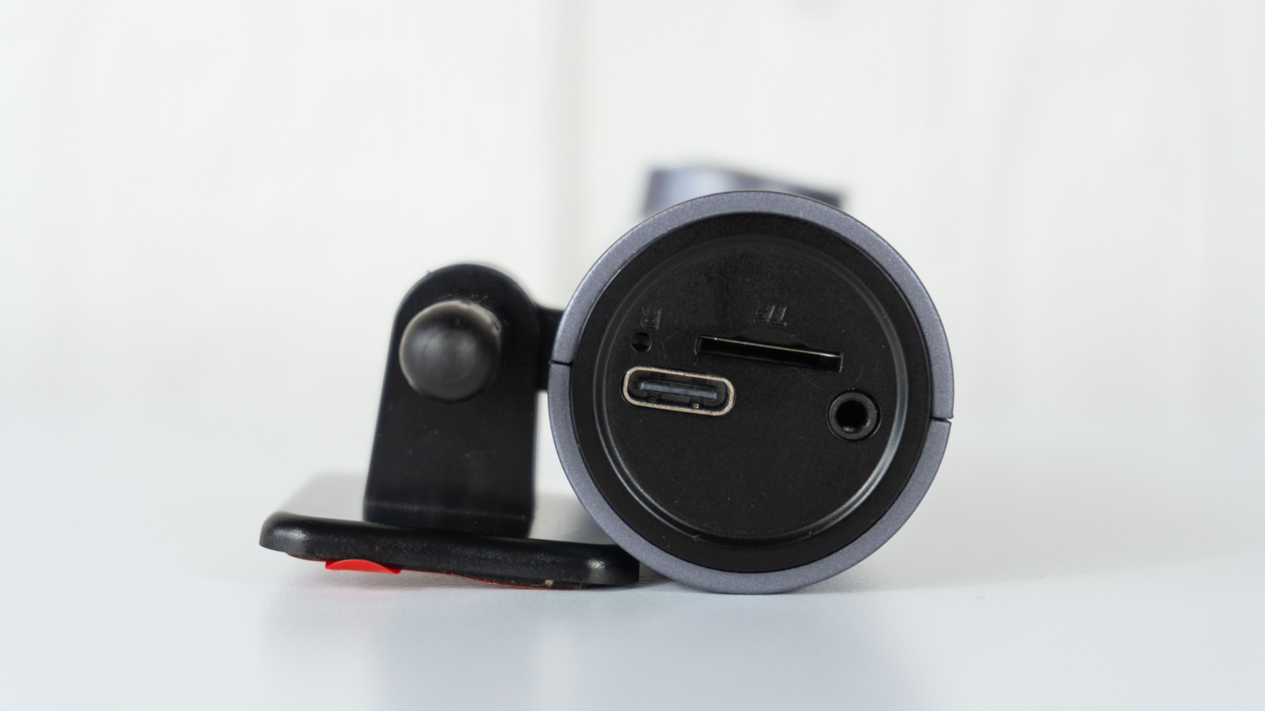 A side view of the Ottocast OttoSafe Cam's ports and microSD card slot