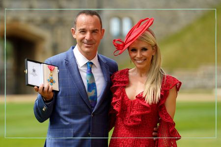 Martin Lewis and his wife Lara Lewington with his CBE award