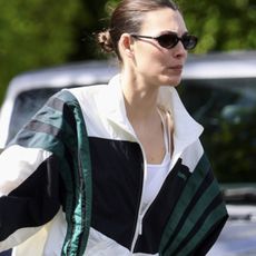 Italian supermodel Vittoria Ceretti is spotted leaving the gym in West Hollywood wearing a windbreaker, flared leggings, and white On sneakers.