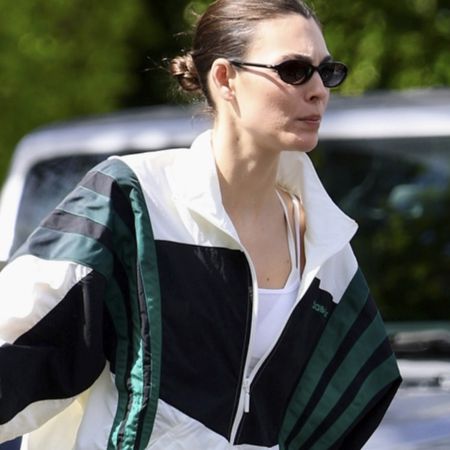 Italian supermodel Vittoria Ceretti is spotted leaving the gym in West Hollywood wearing a windbreaker, flared leggings, and white On sneakers.