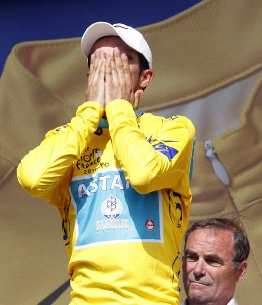 Hinault looks as though he's about to push Contador off the podium