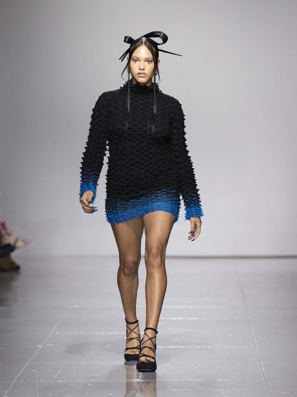 on the runway at London Fashion Week AW23