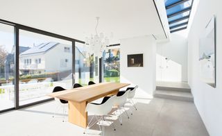 Study room with white walls conference table and chairs