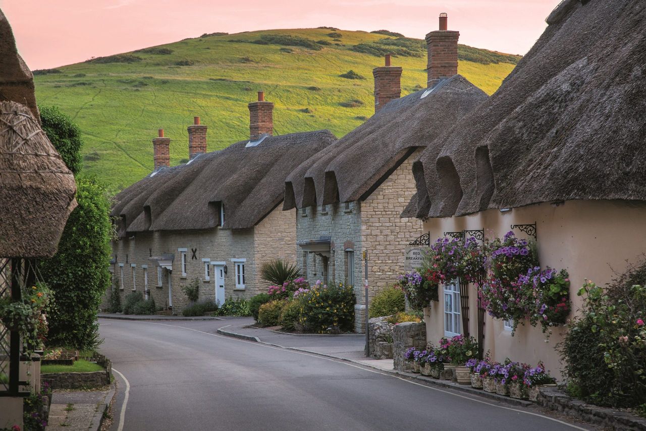 A proliferation of thatched properties, such as the cottages of West Lulworth in Dorset, means there is no shortage of work for Cambridgeshire-based master thatcher Stuart Dodson and his 600–900 fellow heritage craftspeople across the UK