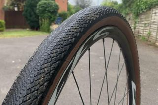 Hutchinson Overide 50mm gravel tire mounted on a rim