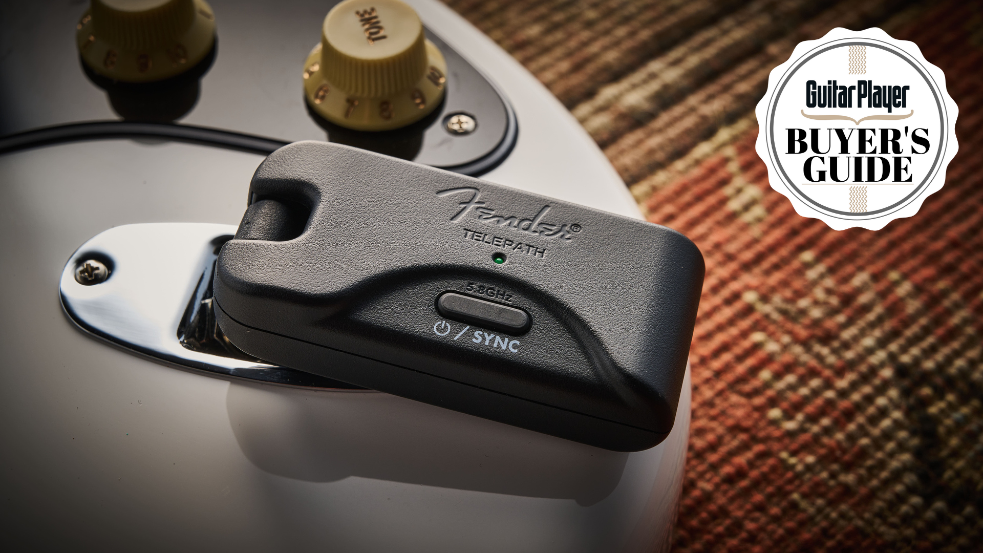 A Fender Telepath wireless transmitter sticking out of a Stratocaster electric guitar