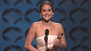 Jennifer Lawrence accepting her Oscar at the 2013 Academy Awards 