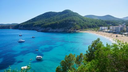 Aerial view of beach and mountains in Ibiza, Balearic Islands, Spain