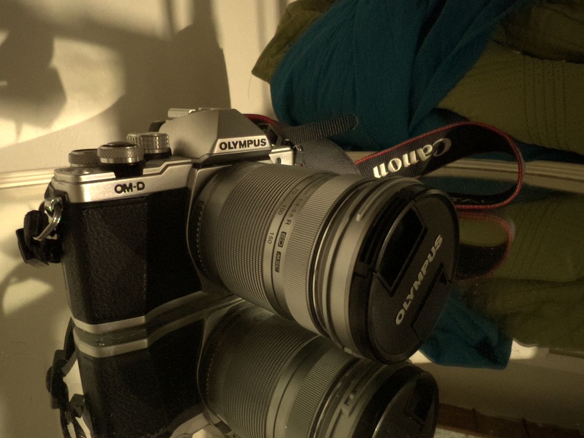 DSLR in low light taken with Night Mode on iPhone 13 Pro
