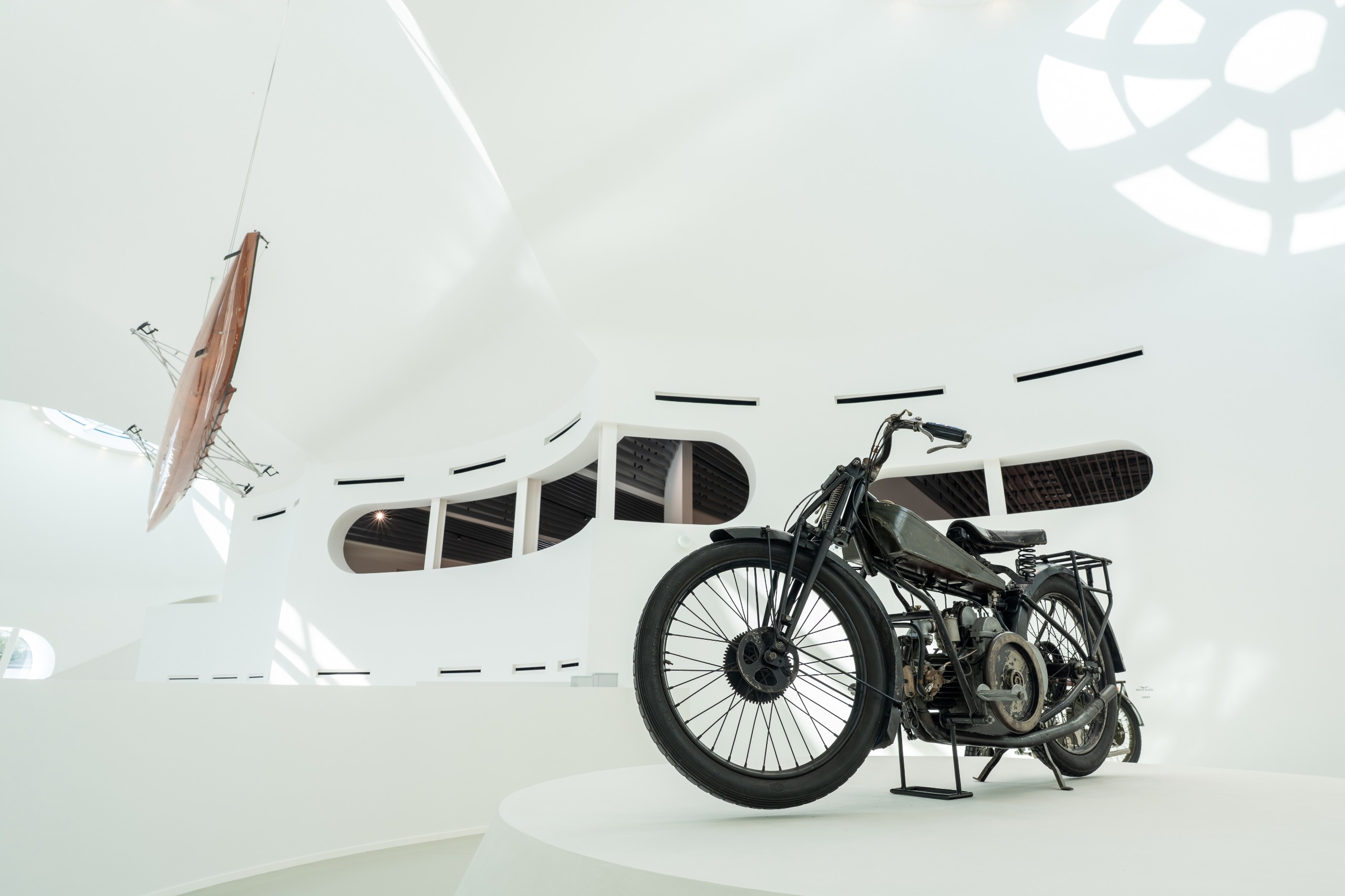 Motorbike on display inside Moto Guzzi museum at Mandello del Lario