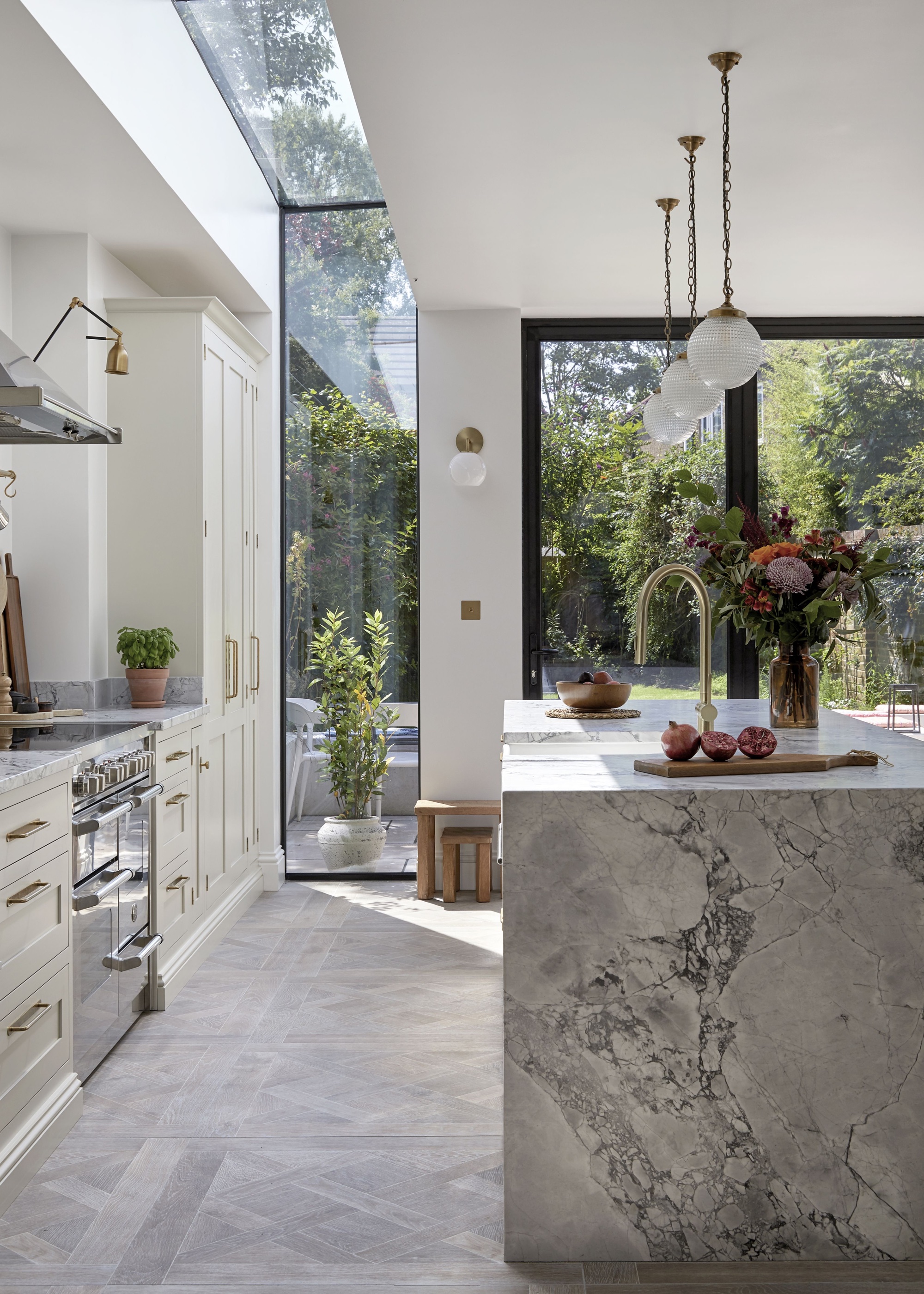 white kitchen with marble kitchen island by Olive &amp;amp; Barr