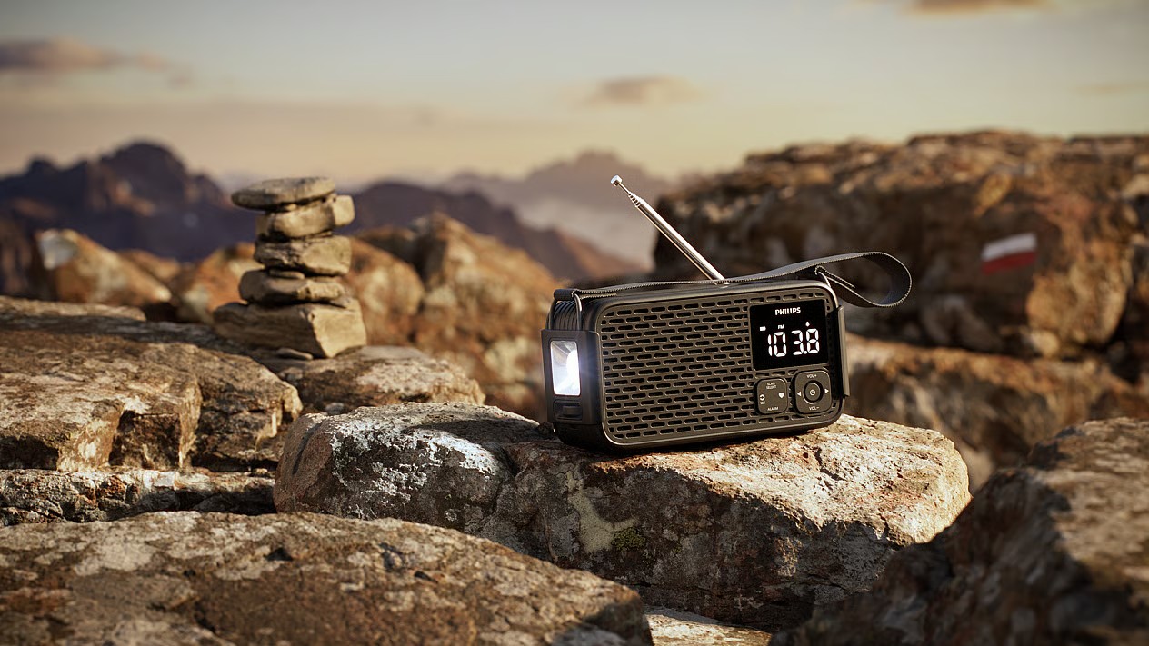 Philips TAR3500 portable radio outdoors on a rocky background 