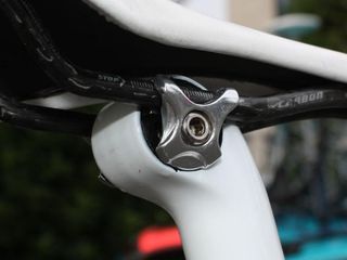 The carbon rails don't quite fit perfectly in the Madone seat mast's clamp but it apparently works well enough.