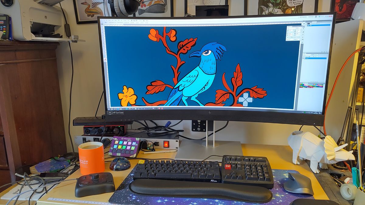 A HP E34m G4 monitor on a desk