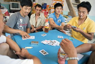 Chinese men playing cards