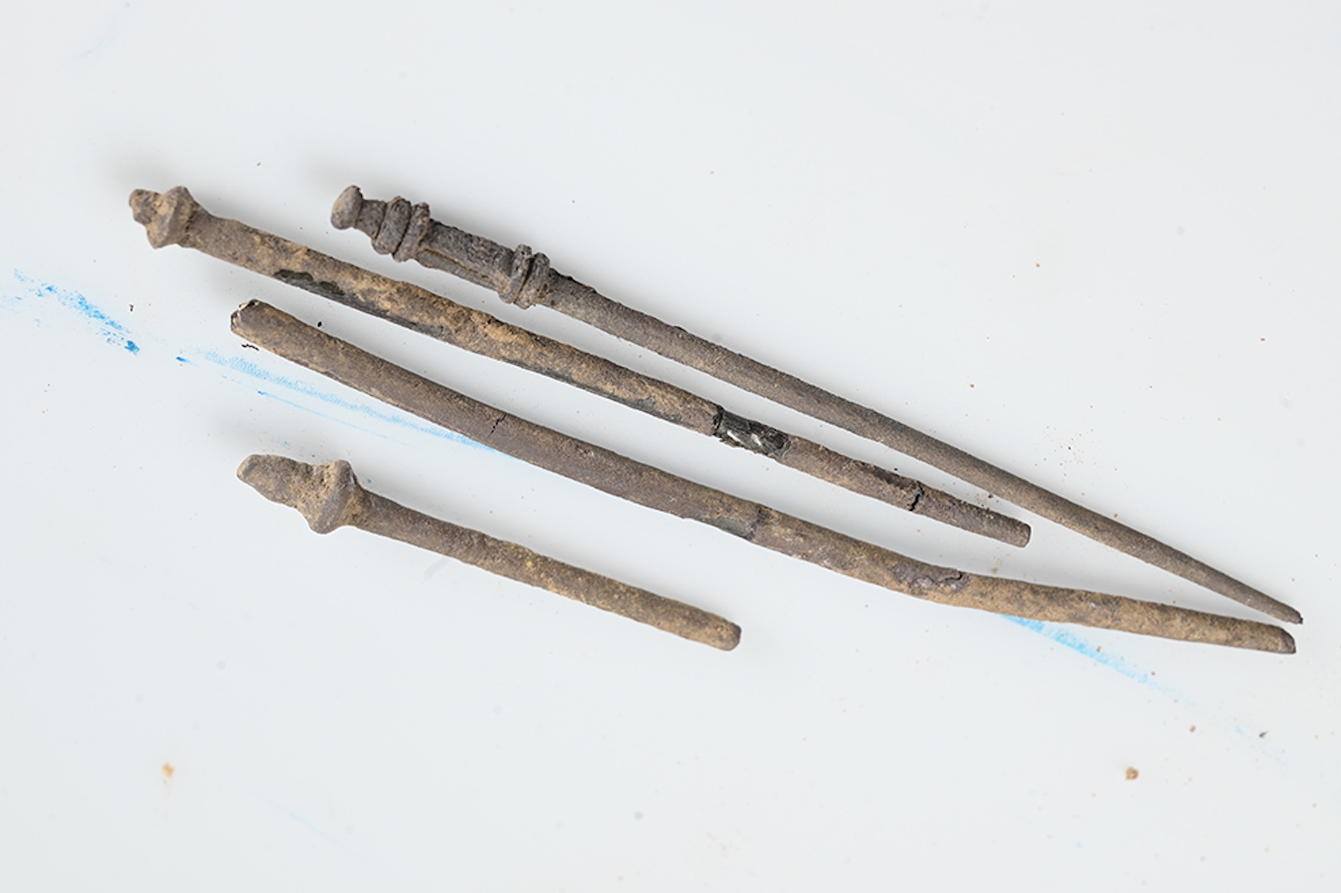 four metal pins