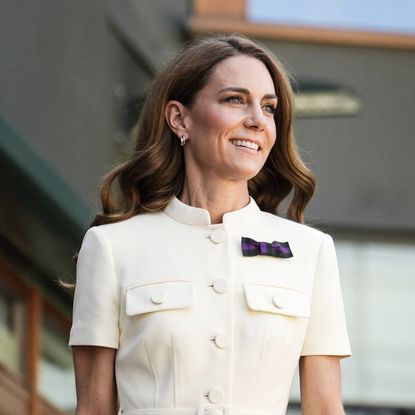 Princess Kate wears a structured white dress to attend Wimbledon and has long wavy brown hair