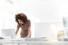 Young business woman working on a laptop