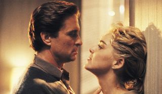 Basic Instinct Michael Douglas and Sharon Stone get close against a wall