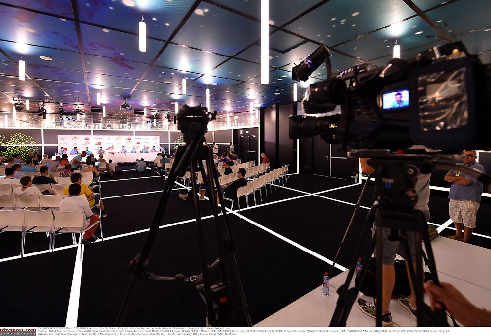 The press await the start of the press conference