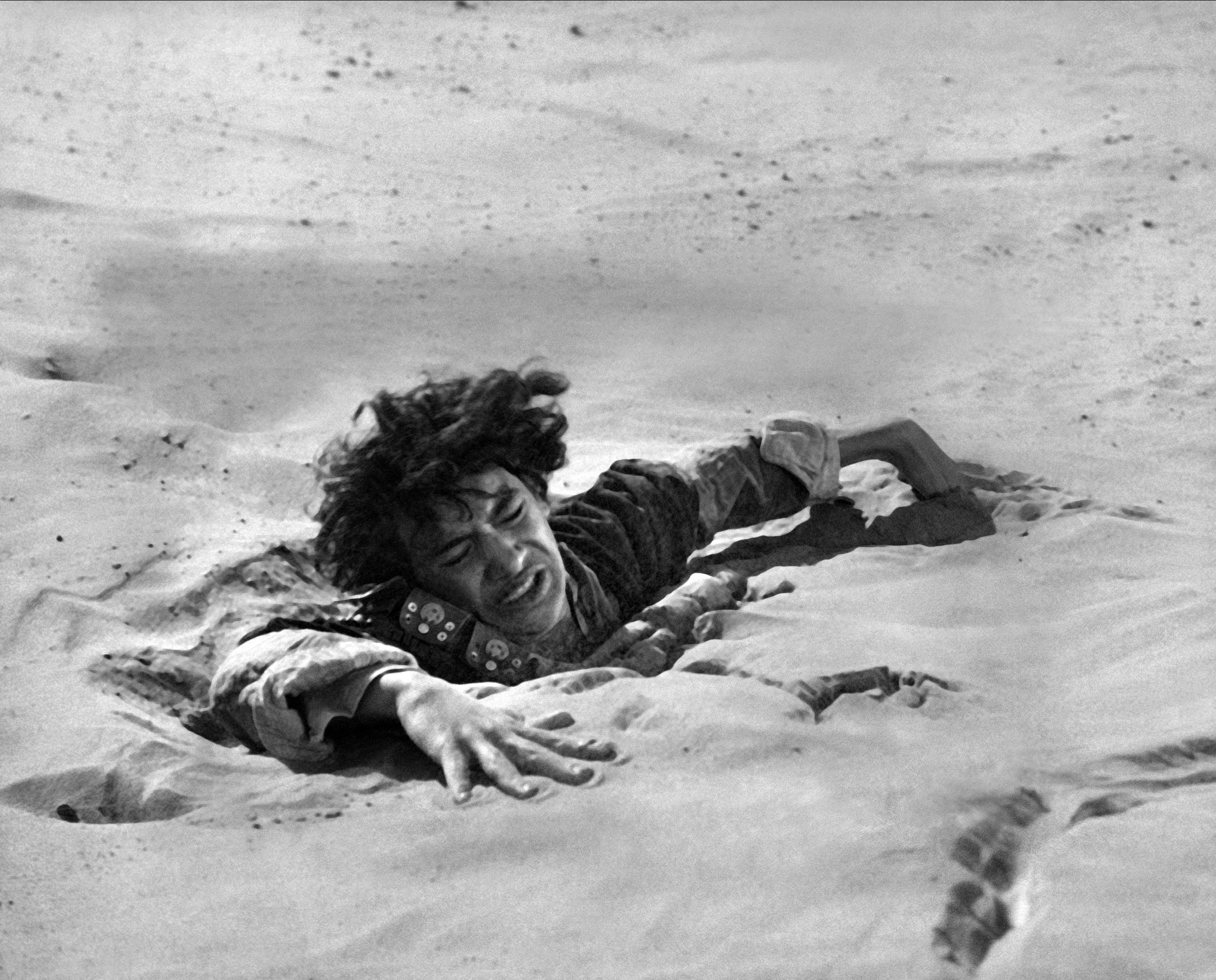 A scene from Lawrence of Arabia, showing T E Lawrence's servant Daud sinking into quicksand