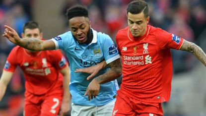 Raheem Sterling of Manchester City and Philippe Coutinho of Liverpool