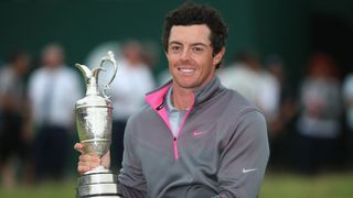 Rory McIlroy poses with the trophy after winning the 2014 Open Championship