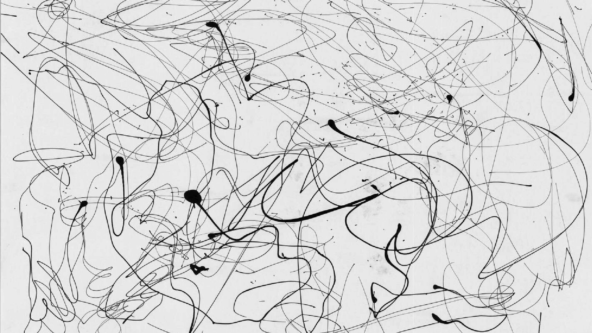 This image shows a simple black-and-white abstract drawing dominated by loosely looping and swirling thin black lines and a few thicker splatters, typical of a child&#039;s messy, spontaneous drawing.