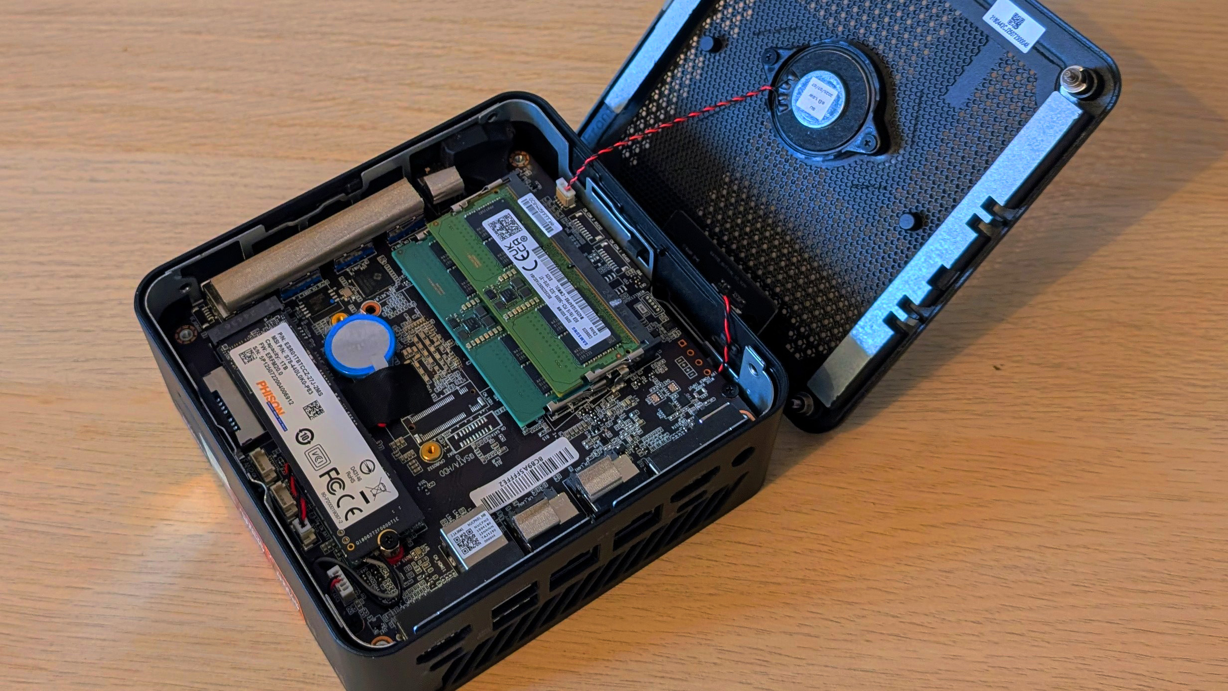 The MSI Cubi Z AI 8M on a desk