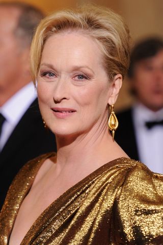 Meryl Streep pictured with an updo as she arrives at the 84th Annual Academy Awards held at the Hollywood & Highland Center on February 26, 2012 in Hollywood, California.