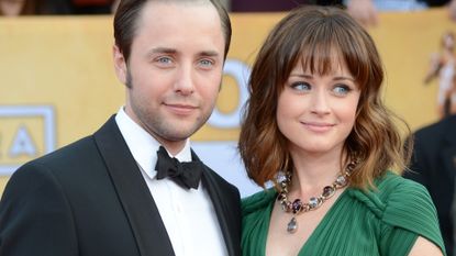 Actors Vincent Kartheiser (L) and Alexis Bledel arrive at the 19th Annual Screen Actors Guild Awards held at The Shrine Auditorium on January 27, 2013 in Los Angeles, California