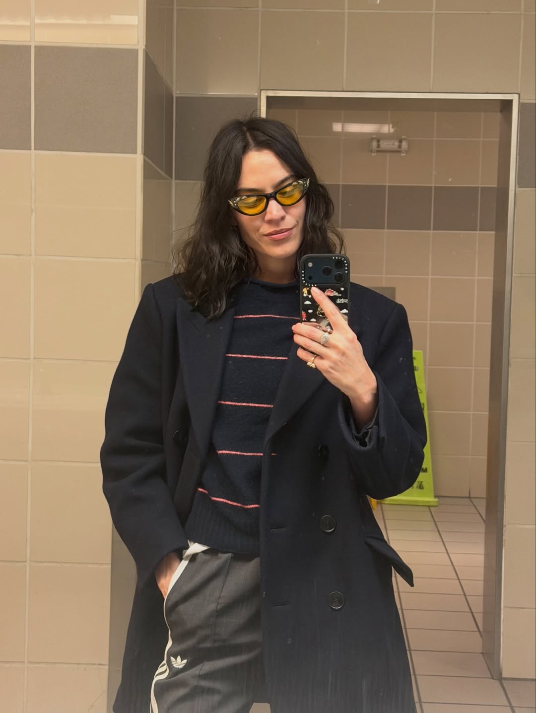 Alexa Chung wearing sporty trousers