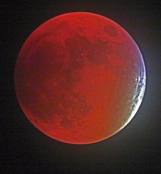 Despite lots of clouds and rain on the way, Victor Rogus grabbed this picture of the Sept. 27 'supermoon' lunar eclipse in Manatee County, Florida. -- "Before clouds doomed my efforts," he told Space.com.