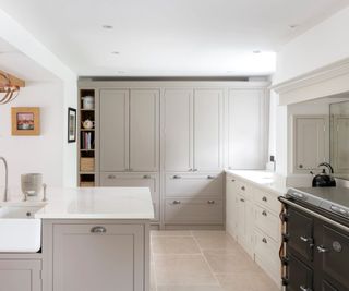 A neutral kitchen with iron hardware