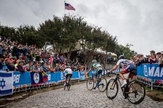 The lead trio climbs Libby Hill during the 2015 women's UCI World Championship Road Race.