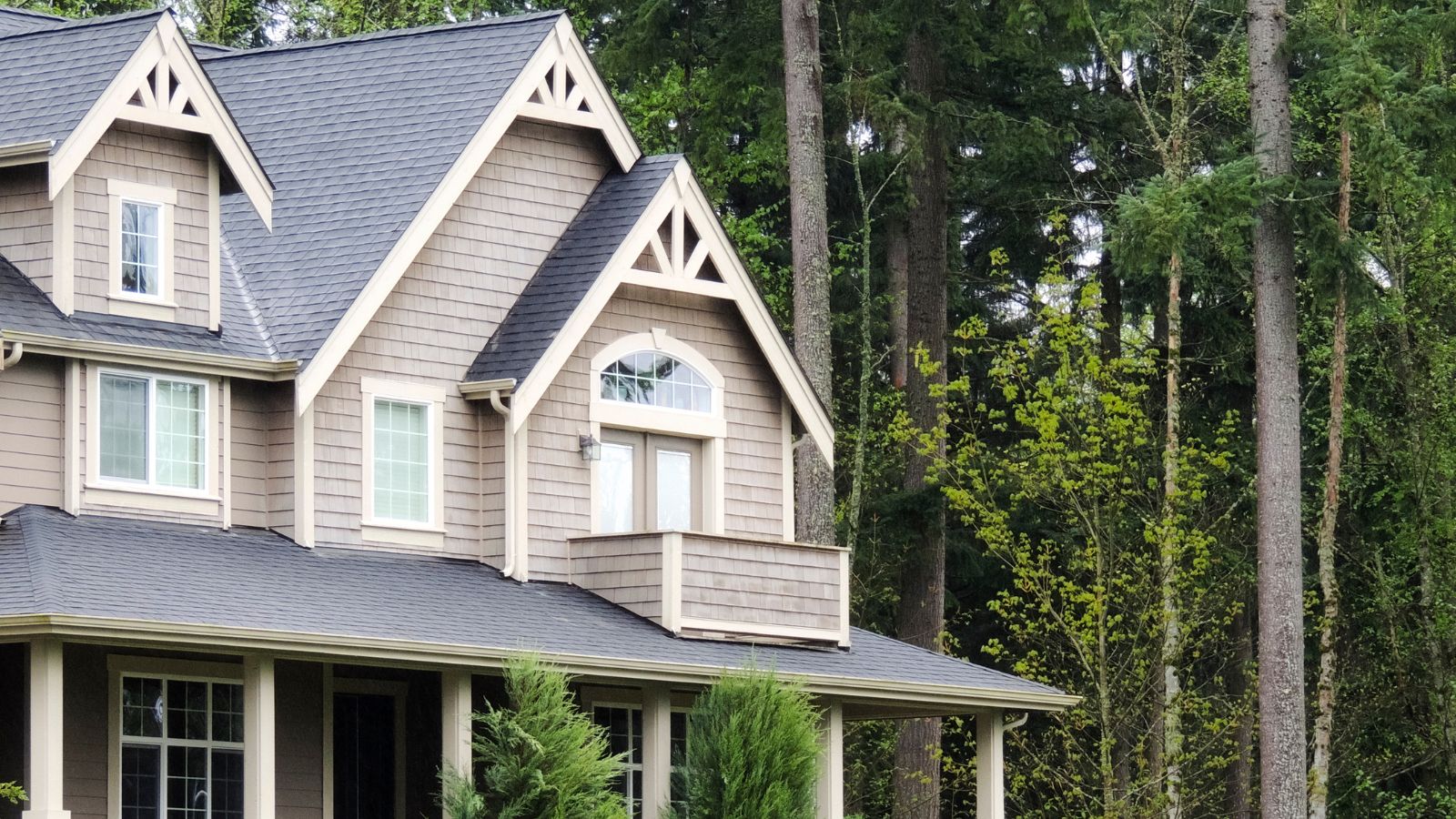 A metal roof on a large American suburban home. 
