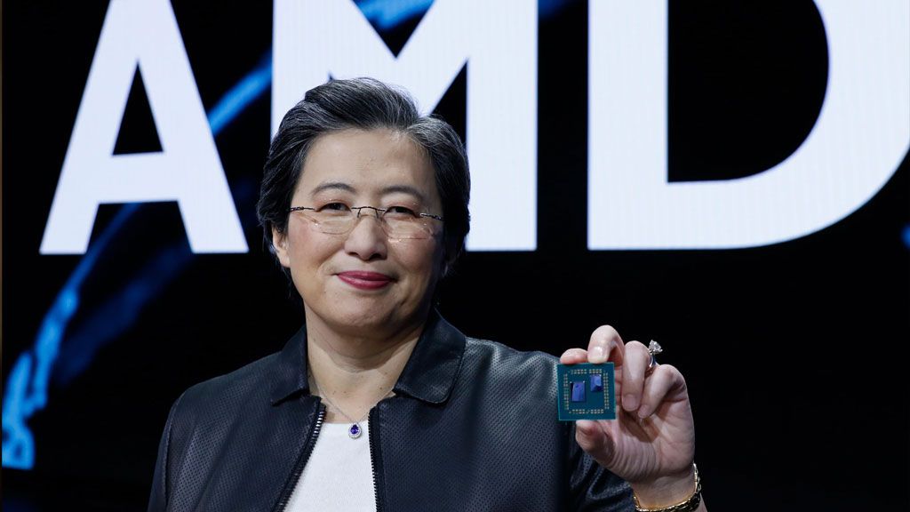 AMD CEO Dr. Lisa Su holding a Ryzen processor.