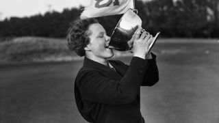 Patty Berg from Minneapolis toasting to her victory at the Palm Beach Women's Annual Golf Championship