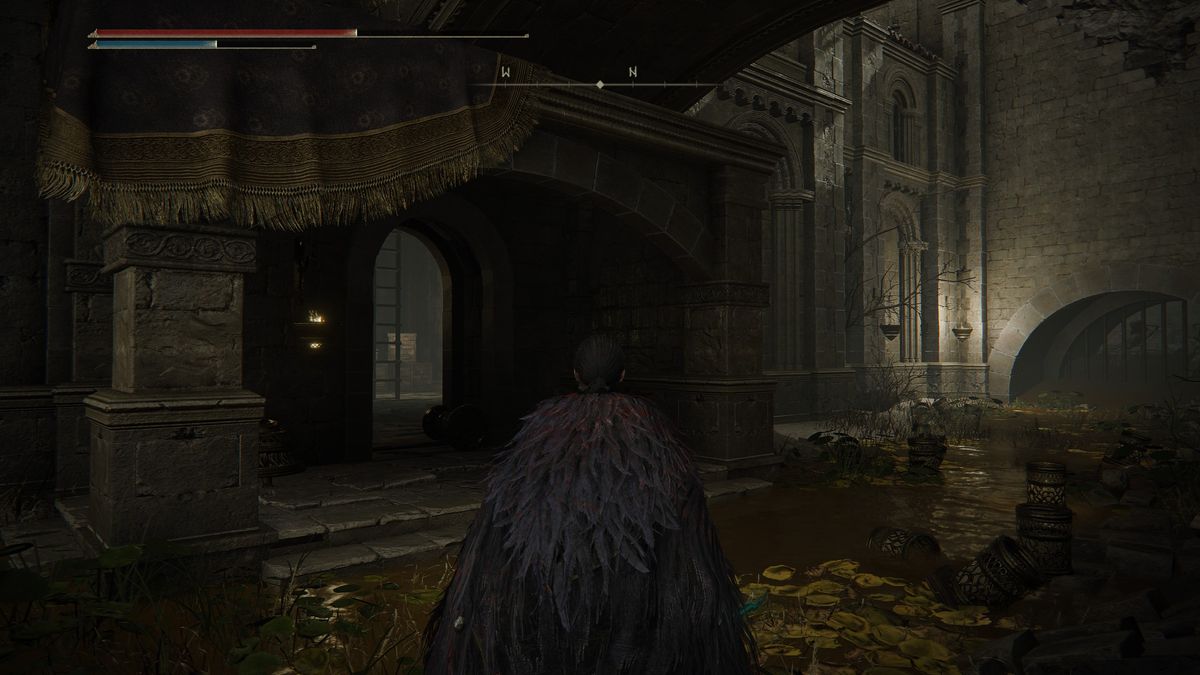 Elden Ring ninja character exploring Belurat Tower Settlement showing location of Well Depths Key and the well to use it in