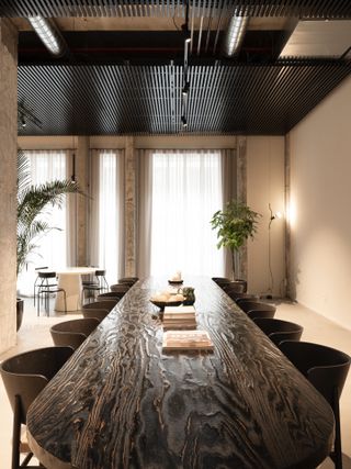 A dark wood board room table