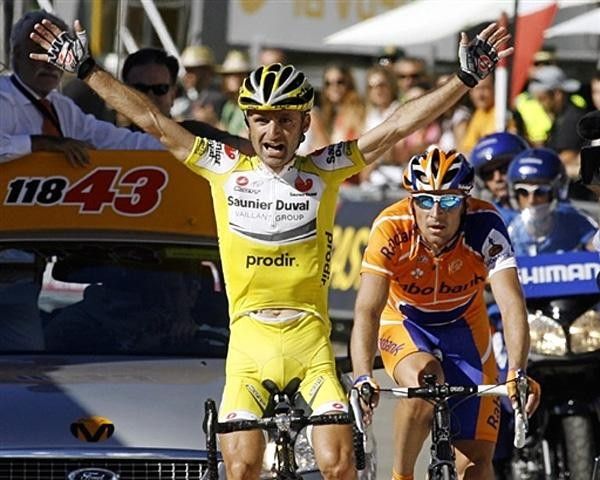 The Italian beat Denis Menchov of Rabobank, but the latter was happy to get the jersey oro.