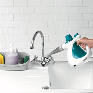 kitchen tap with handheld steam cleaner